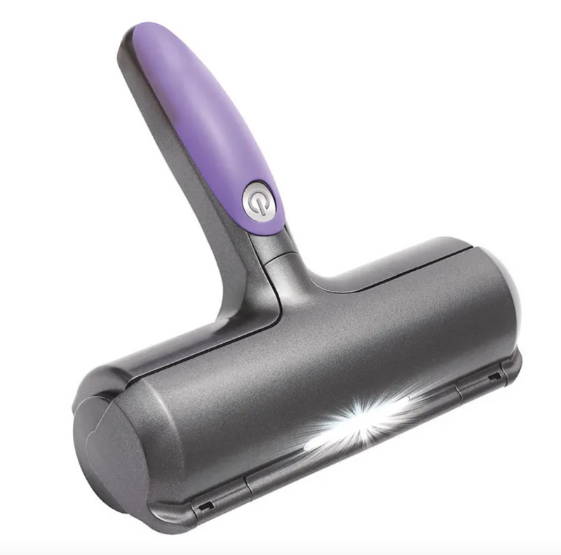 Grey self-cleaning pet hair roller with a purple handle